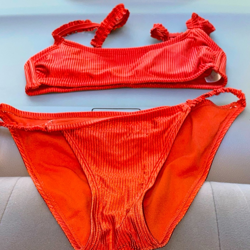 Small bathing suit and small cute top with ruffles